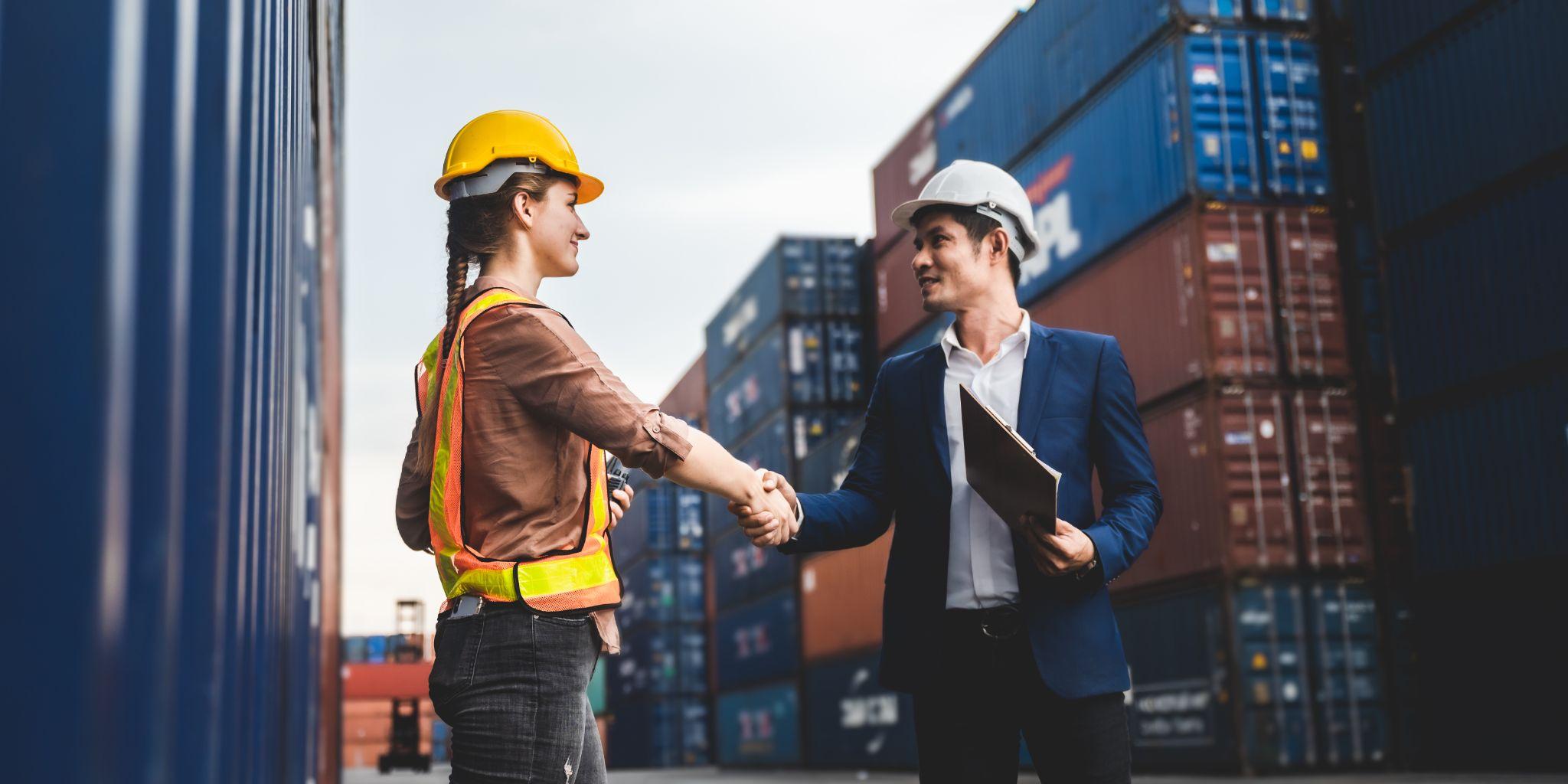 Attorney shaking hands with a maritime worker