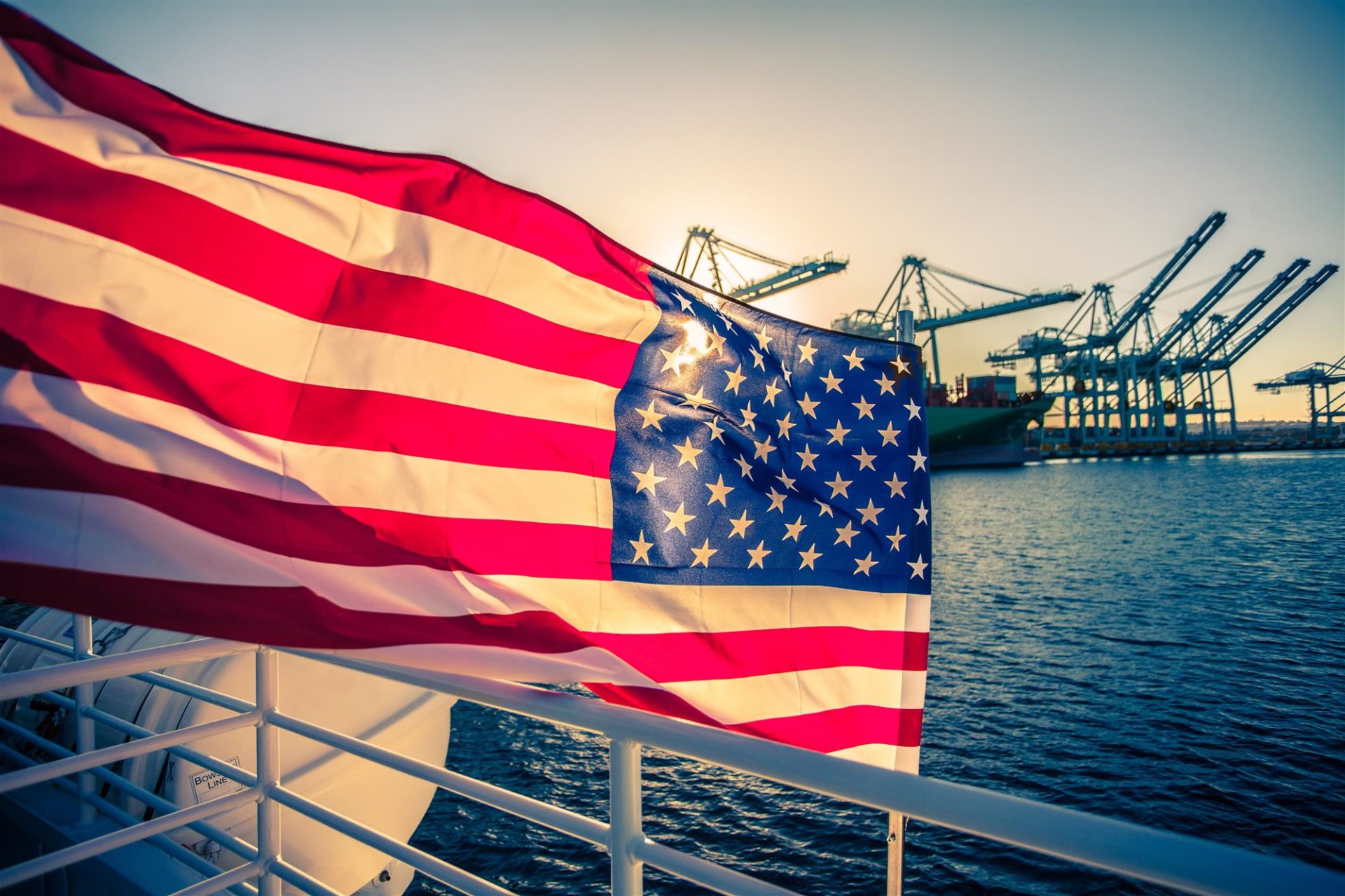american flag waving on a boat