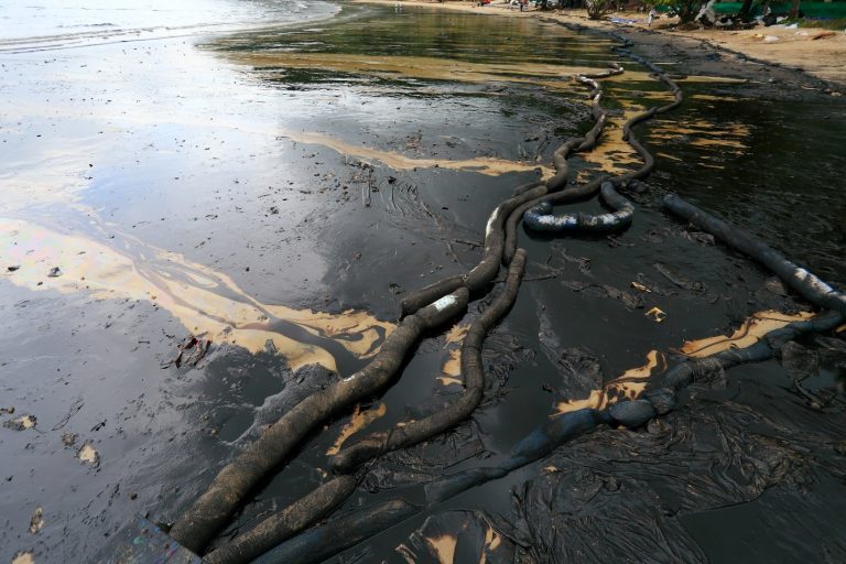 crude oil spill on the beach