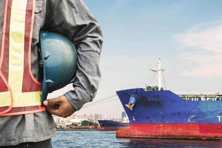 engineer holding a helmet for the safety of workers