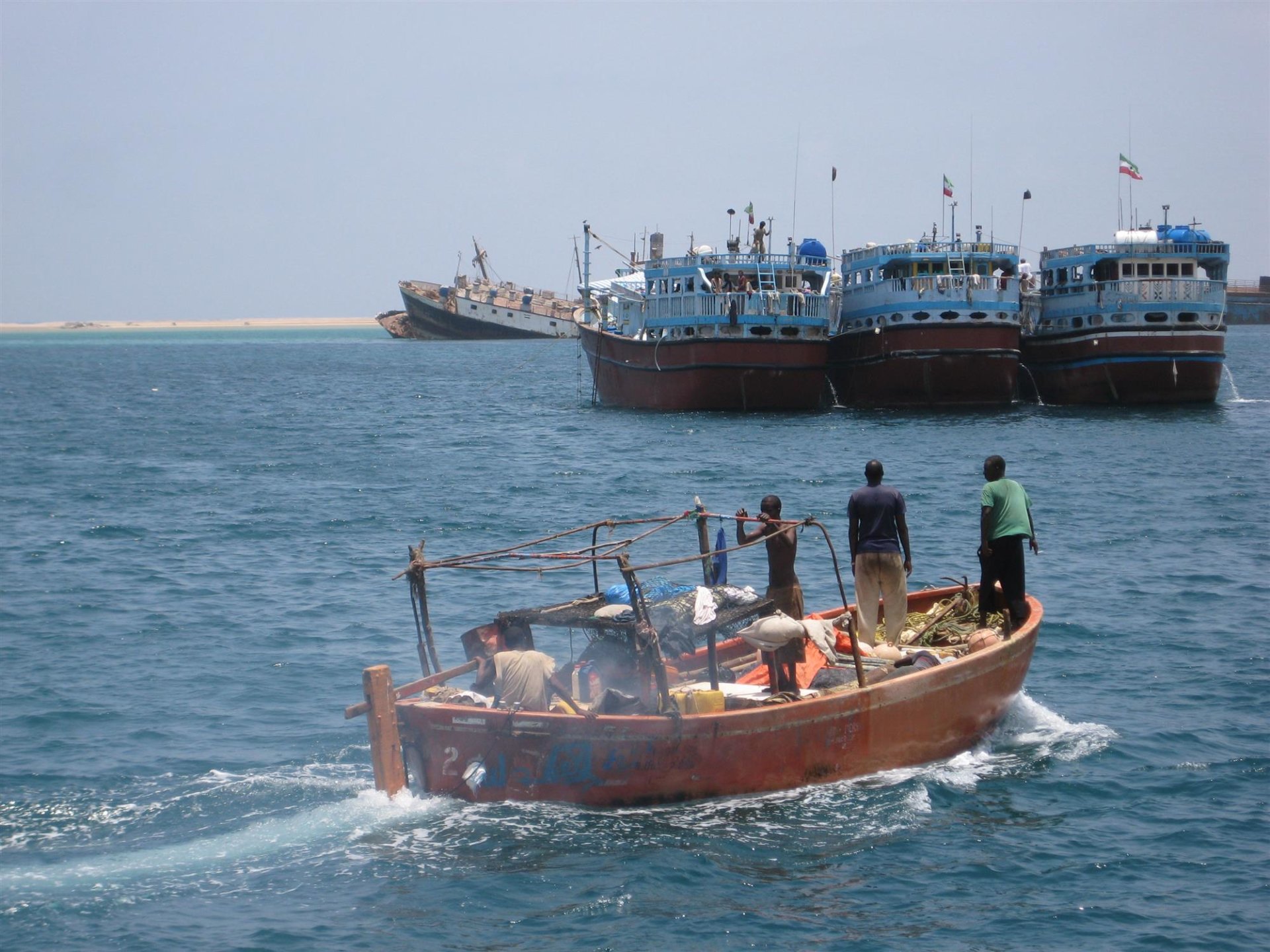 local african fishermen in boat