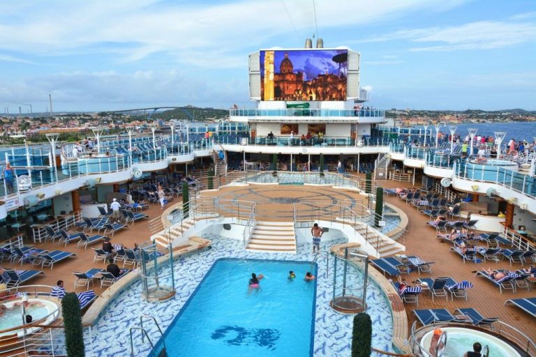 Open deck of Royal Princess ship docked in Caribbean island