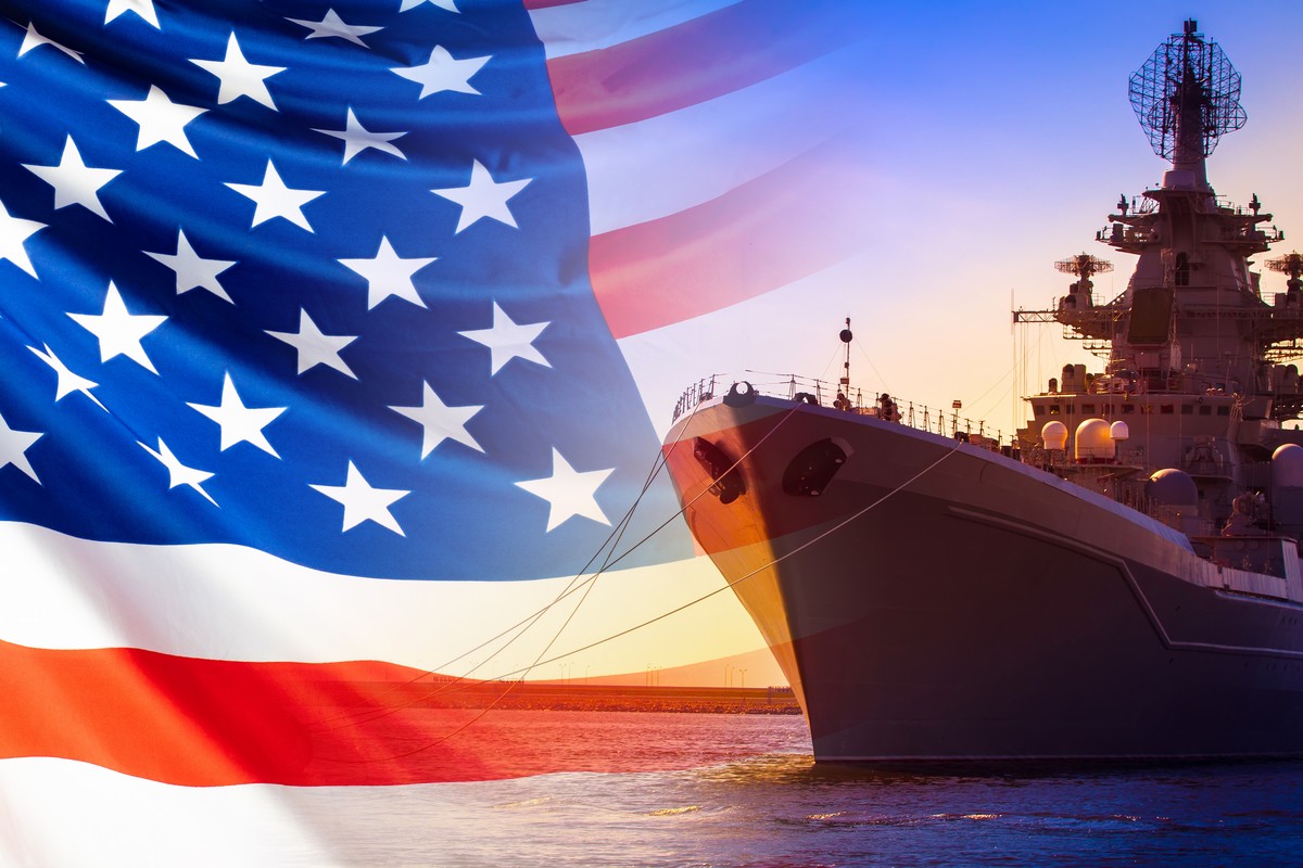 US Warship with background of the American flag.
