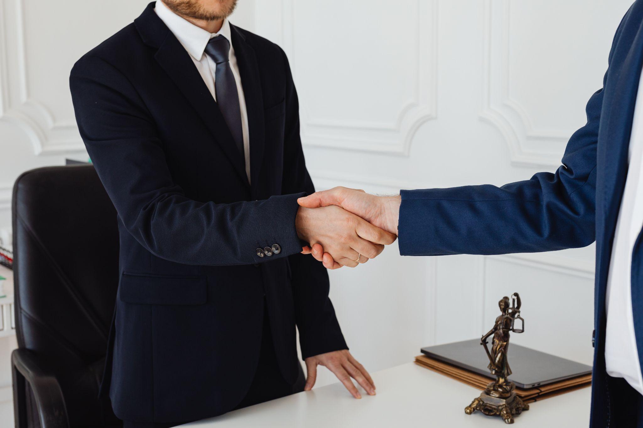 Hand shake of two men