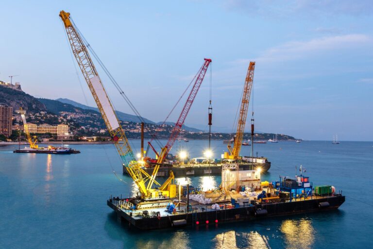 Maritime barge ships with cranes