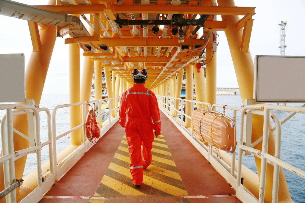 Offshore oil rig worker walking